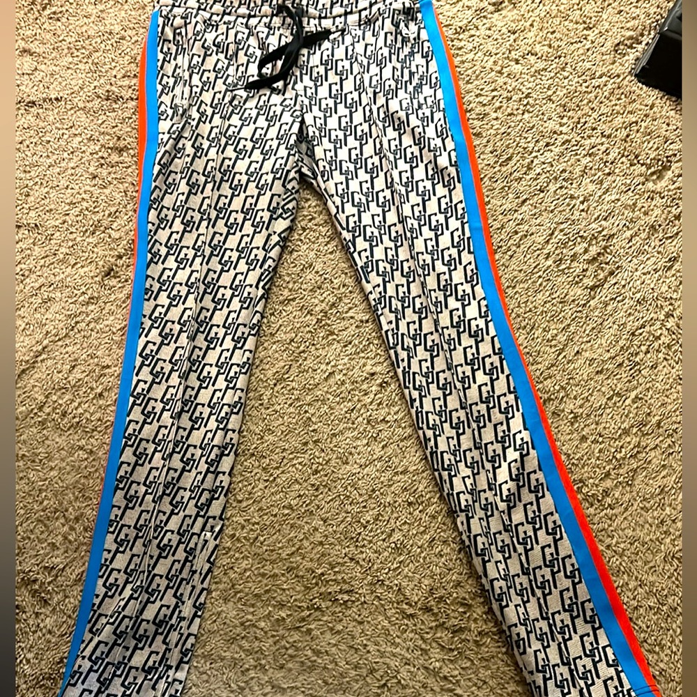 Pam & Gela “PG” print track suit pants
